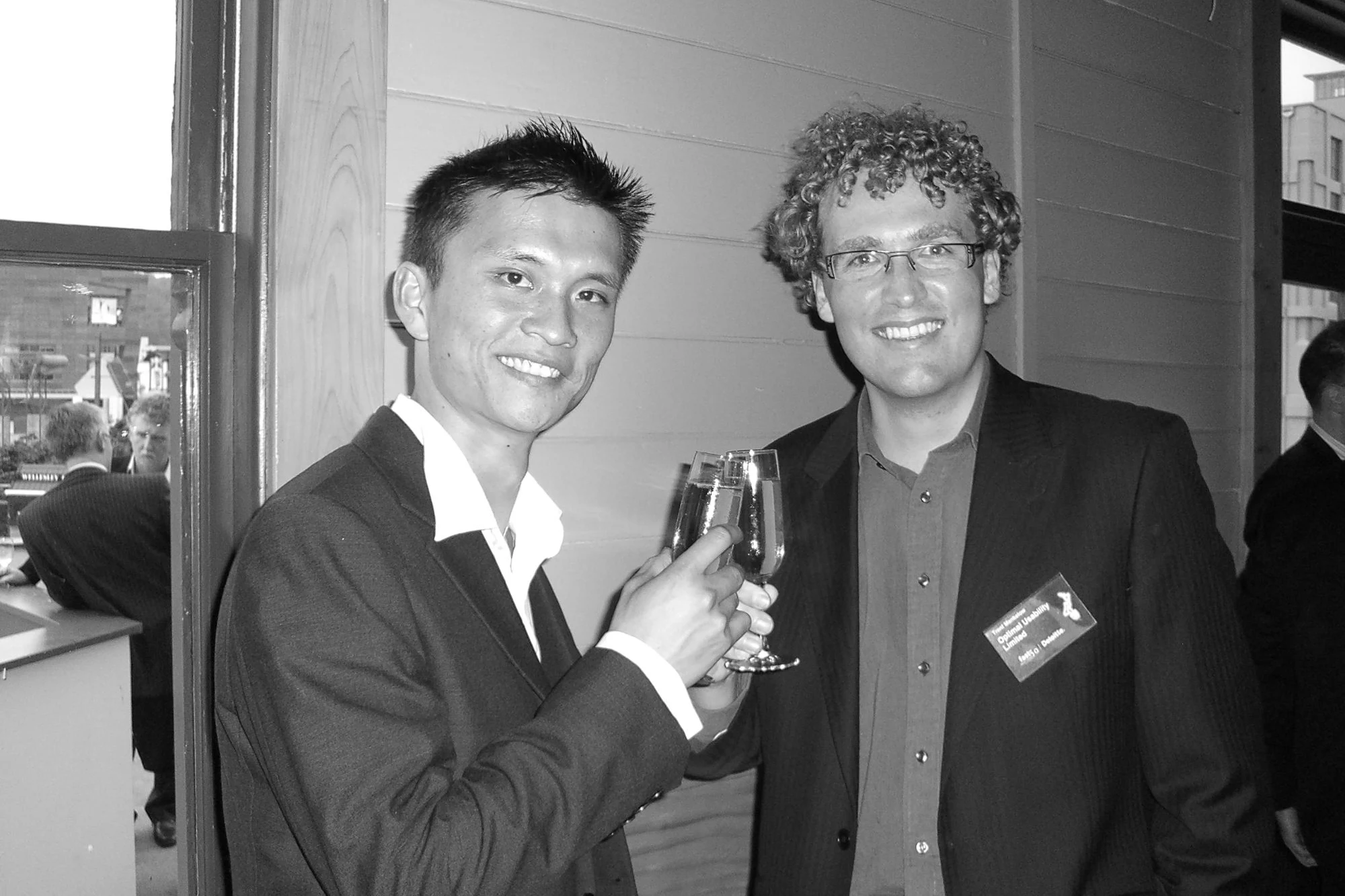 Trent and Sam toasting with champagne at the Deloitte Fast 50 awards